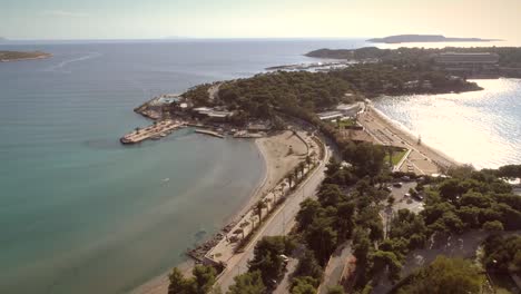 Aerial-view-of-relaxing-residential-area-located-at-seaside-in-Greece.