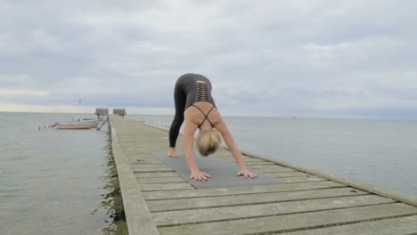 Girl-making-yoga-pose-on-bridge