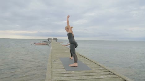 Girl-making-yoga-pose-on-bridge