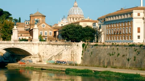 tracking-shot-from-the-Castel-Sant'Angelo-bridge-towards-the-dome-of-the-Vatican,-Rome