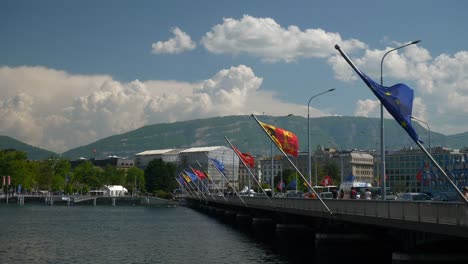 sunny-geneva-city-lakeside-traffic-bridge-slow-motion-panorama-4k-switzerland