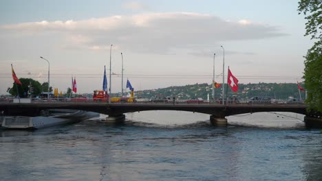 evening-time-geneva-city-famous-traffic-mont-blanc-bridge-slow-motion-panorama-4k-switzerland