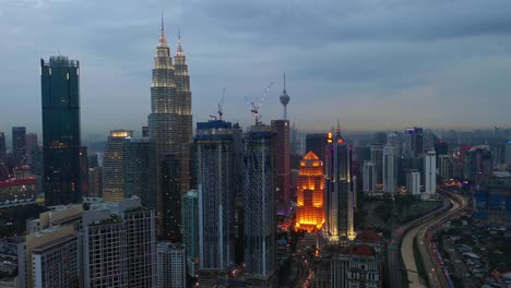twilight-illumination-kuala-lumpur-downtown-traffic-road-aerial-panorama-4k-malaysia