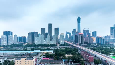 Zeitraffer-von-Jianwai-SOHO,-der-CBD-Skyline-von-Tag-zu-Nacht-in-Peking,-China