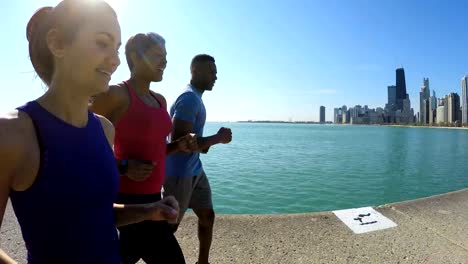 Multi-Ethnic-American-male-and-females-running-together