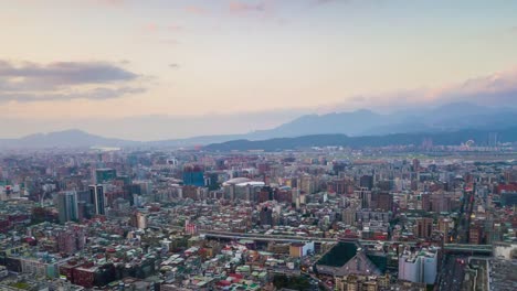 paisaje-de-atardecer-cielo-taipei-aérea-panorama-4k-timelapse-Taiwán