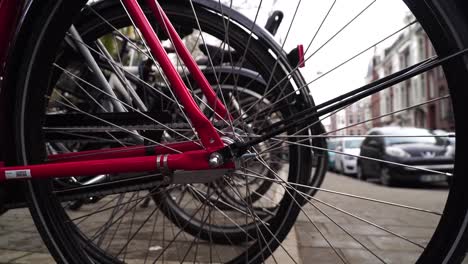 Bikes-parking-in-Amsterdam.wheel-close-up