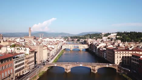 Florence,-Tuscany,-Italy.-Aerial-view-on-Arno-river-and-St-Trinity-and-Ponte-Vecchio-bridges