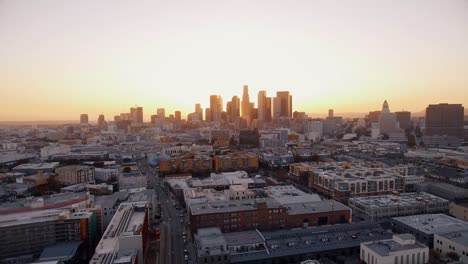 Aerial-shot-looking-towards-Downtown-Los-Angeles-during-the-sunset