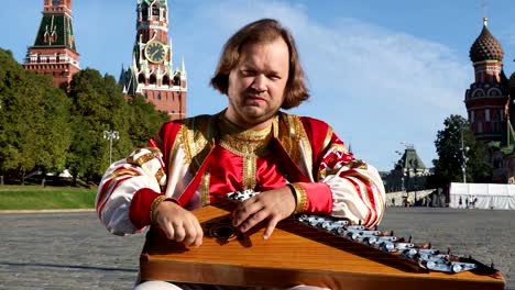 Portrait-of-a-musician-with-music-instrument-gusli