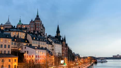 Stockholm-Sweden-time-lapse-4K,-city-skyline-day-to-night-sunset-timelapse-at-Slussen