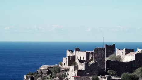 Stone-old-tower-house-on-Mani,-Greece.-Time-lapse