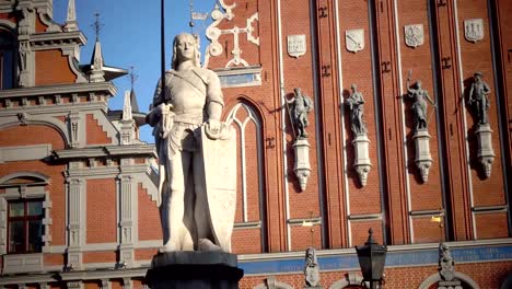 view-of-a-monument-to-Roland-at-Town-Hall-Square-against-the-background-House-of-the-Blackheads-of-Riga-Latvia