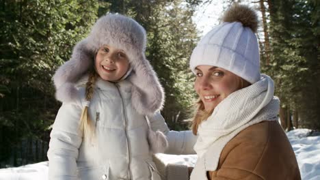 Beautiful-Mother-and-Daughter-Smiling-at-Camera