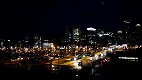 Boston-Skyline-at-night-with-helicopter-flying