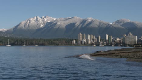 Kitsilano-Beach,-Mountain-Snow,-English-Bay-4K