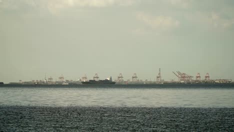 Cargo-ship-sails-on-the-sea.-Philippines,-Manila