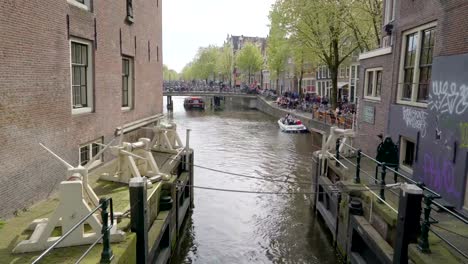 The-big-boat-cruising-the-canal-in-Amsterdam