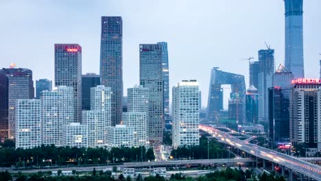 Zeitraffer-von-Jianwai-SOHO,-der-CBD-Skyline-von-Tag-zu-Nacht-in-Peking,-China