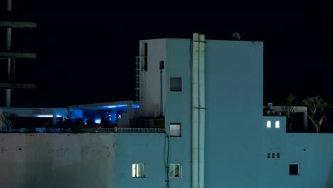 Timelapse-of-dancing-people-at-night-party-on-rooftop