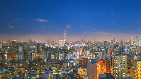 4K.-Vista-en-tiempo-de-lapso-de-la-ciudad-de-Tokio-en-Nigh-twith-torre-de-Tokio-en-Japón