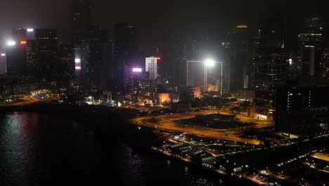 Dubai-ciudad-nocturna-con-las-luces-de-la-ciudad,-ciudad-nueva-de-alta-tecnología-de-lujo,-en-Medio-Oriente.-Stock.-Vista-superior-de-los-rascacielos-en-Dubai-por-la-noche