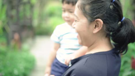 Mother-and-son-Walking-in-the-Garden