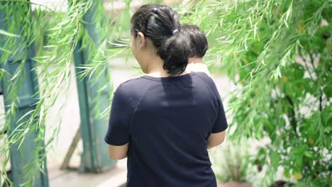 Mother-and-son-Walking-in-the-Garden