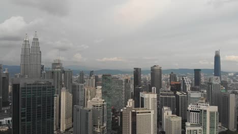 aerial-sweep-of-entire-kuala-lumpur-downtown-petronas