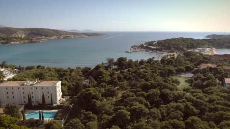 Aerial-view-of-relaxing-residential-area-located-at-seaside-in-Greece.