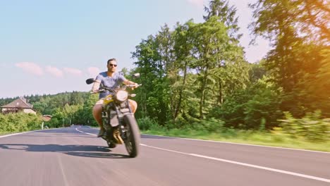 modern-scrambler-motorbike-on-the-forest-road-riding