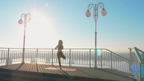 yoga-and-pilates-exercises-on-the-roof