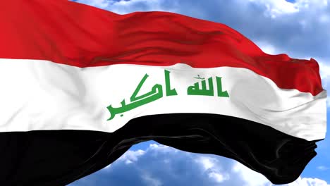 ondeando-la-bandera-contra-el-cielo-azul-de-Iraq