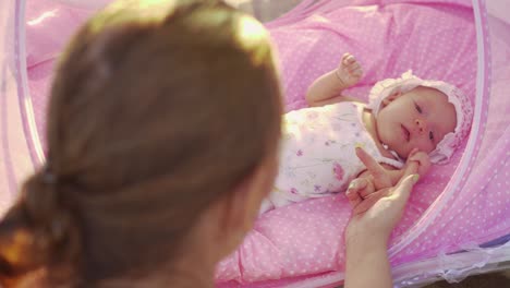 Baby-holding-mothers-hand