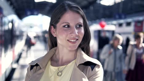 Young-Caucasian-woman-traveling-at-the-train-station