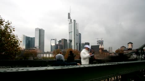 People-walking-over-a-bridge-in-Frankfurt