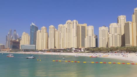 uae-dubai-marina-jbr-living-block-sunny-day-beach-panorama-4k