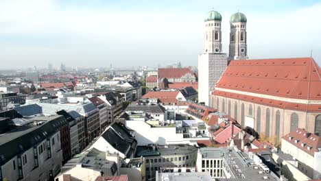 Frauenkirche-at-historical-city-of-Munich.-Cityscape-overview-from-top-of-town-hall.
