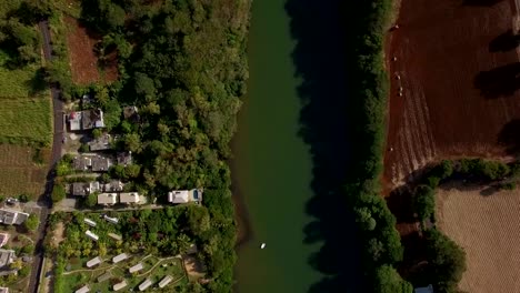 Aerial-view-of-river,-town-and-farmland-in-Mauritius