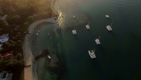 Flying-over-Mauritius-coast-at-sunset