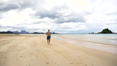 Man-running-on-the-beach