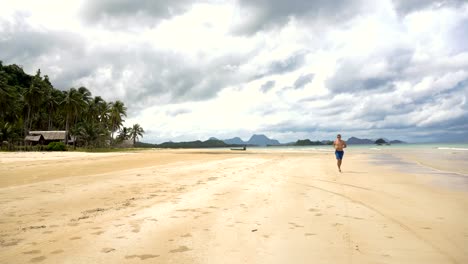 Man-running-on-the-beach