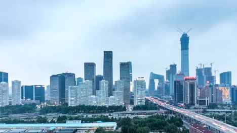 Zeitraffer-von-Jianwai-SOHO,-der-CBD-Skyline-von-Tag-zu-Nacht-in-Peking,-China