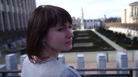 tourist-girl-walks-and-looks-at-attractions-in-the-city-of-Brussels-Belgium.-slow-motion