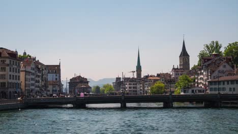 switzerland-sunny-day-zurich-river-cityscape-bridge-panorama-4k-timelapse