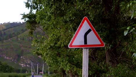 Road-sign.-A-sharp-turn.