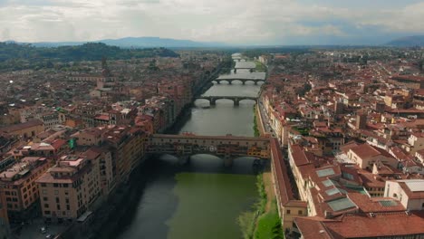 Aerial-View-of-Florence,-Italy,-The-Ponte-Vecchio-Old-Bridge-,-Arno-River-4K