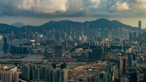 4K-de-Time-lapse:-puesta-de-sol-sobre-el-puerto-de-Victoria-en-Victoria-Peak,-Hong-Kong