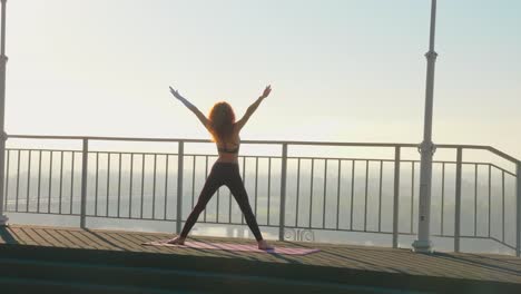 yoga-and-pilates-exercises-on-the-roof