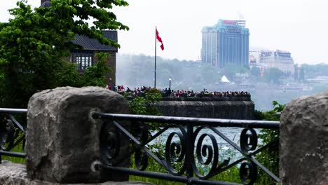 Niagara-Falls-area-with-tourist-on-the-border-between-Canada-and-the-USA